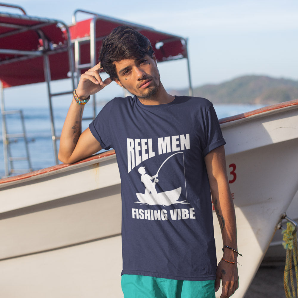 man holding fish t shirt